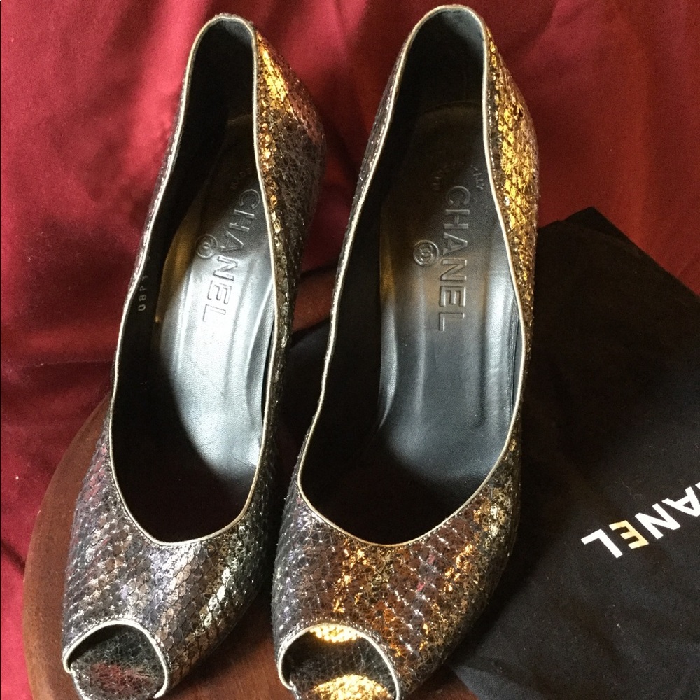 Chanel snakeskin pumps.